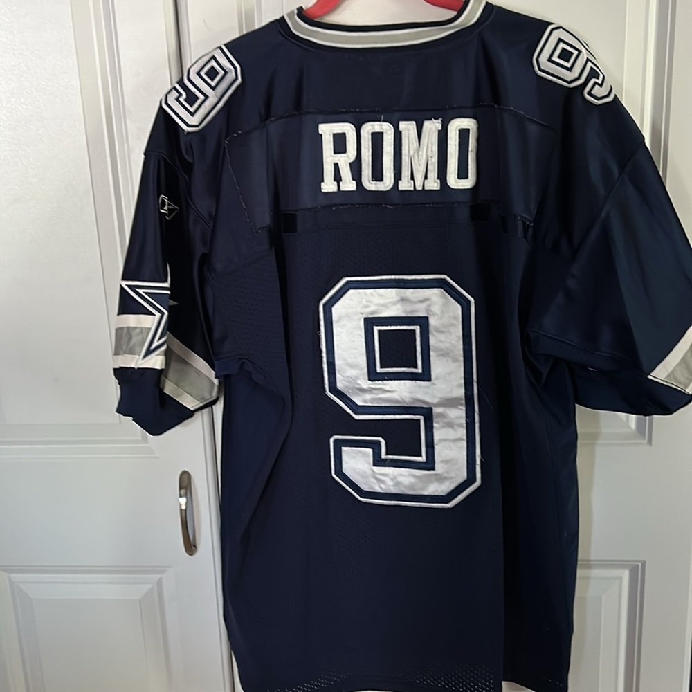 Vintage Romo, size 52 Reebok jersey, official NFL equipment. Gently used.